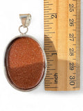 Goldstone Silver Overlay Pendant