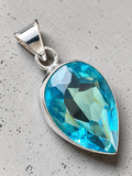 Synthetic Blue Topaz Silver Overlay Pendant