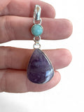 Making Waves Jewelry and Accessories sterling silver pendant featuring a purple amethyst teardrop and turquoise stone.