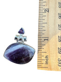 Making Waves Jewelry and Accessories handcrafted chevron amethyst pendant in 925 sterling silver with faceted accent.