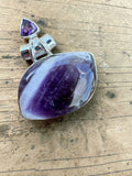 Making Waves Jewelry and Accessories handcrafted chevron amethyst pendant in 925 sterling silver with faceted accent