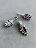 Making Waves Jewelry and Accessories amethyst and sterling silver jewelry set with marquise-cut stones and beaded edges