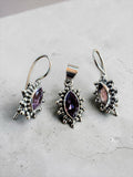 Making Waves Jewelry and Accessories amethyst and sterling silver jewelry set with marquise-cut stones and beaded edges