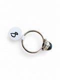 Making Waves Jewelry and Accessories teardrop Ammolite ring in sterling silver with rope-style detailing