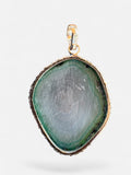Making Waves Jewelry and Accessories banded agate pendant in sage green and grey with a sterling silver setting.