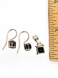 Making Waves Jewelry and Accessories sterling silver drop earrings and pendant set with square-cut black stones
