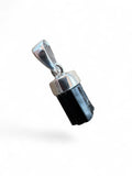 Making Waves Jewelry and Accessories raw black tourmaline crystal pendant with a polished silver-tone bail