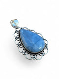 Making Waves Jewelry and Accessories teardrop blue opal pendant in a vintage sterling silver filigree frame
