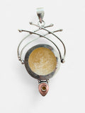 Making Waves Jewelry and Accessories sterling silver pendant featuring a circular golden calcite and yellow gemstone.