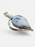 Making Waves Jewelry and Accessories sterling silver pendant with teardrop dendritic opal and moonstone in heart frame