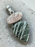 Making Waves Jewelry and Accessories double stone pendant with pink marbled and forest green teardrop stones in silver.