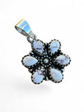 Making Waves Jewelry and Accessories floral pendant featuring white buffalo turquoise stones set in 925 sterling silver.