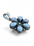 Making Waves Jewelry and Accessories floral pendant with white buffalo turquoise stones set in 925 sterling silver.