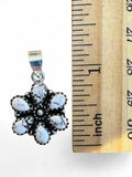 Making Waves Jewelry and Accessories floral pendant with white buffalo turquoise stones set in 925 sterling silver