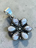 Making Waves Jewelry and Accessories floral pendant with white buffalo turquoise stones set in 925 sterling silver.
