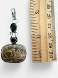 Making Waves Jewelry and Accessories fossil coral pendant in 925 sterling silver with black gemstones and ruler scale