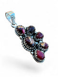 Making Waves Jewelry and Accessories garnet cluster pendant in oxidized 925 sterling silver with beaded detailing