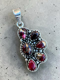 Making Waves Jewelry and Accessories garnet cluster pendant in oxidized 925 sterling silver with beaded detailing