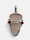 Making Waves Jewelry and Accessories sterling silver pendant with rose quartz and red garnet gemstones