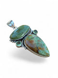 Making Waves Jewelry and Accessories artisan pendant featuring green natural stones set in sterling silver with beadwork.