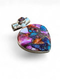 Making Waves Jewelry and Accessories heart-shaped pendant with multi-colored spiny oyster and turquoise mosaic inlay.