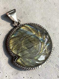 Making Waves Jewelry and Accessories labradorite ammonite fossil pendant in a twisted sterling silver rope setting.