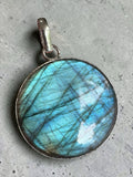 Making Waves Jewelry and Accessories round labradorite pendant with blue and teal labradorescence in sterling silver