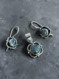 Making Waves Jewelry and Accessories sterling silver pendant and drop earrings set with iridescent labradorite stones