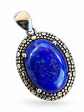 Making Waves Jewelry and Accessories oval Lapis Lazuli pendant in 925 sterling silver with a textured beaded frame.