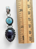 Making Waves Jewelry and Accessories artisan pendant with blue Larimar and purple Amethyst in sterling silver