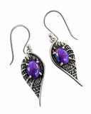 Making Waves Jewelry and Accessories sterling silver dangle earrings with purple oval stones in leaf-shaped settings.