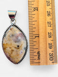 Making Waves Jewelry and Accessories marquise pendant with marbled cream and tan stone set in sterling silver rope trim