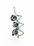 Making Waves Jewelry and Accessories triple meteorite pendant with raw dark iron stones in a polished silver setting