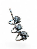 Making Waves Jewelry and Accessories triple stone meteorite pendant with raw dark iron fragments in silver setting