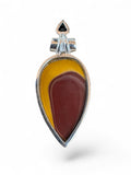 Making Waves Jewelry and Accessories teardrop Mookaite Jasper pendant in sterling silver with a black stone accent.