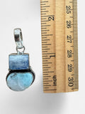 Making Waves Jewelry and Accessories artisan pendant with rectangular moonstone and oval larimar in sterling silver.
