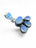 Making Waves Jewelry and Accessories moonstone cluster pendant featuring iridescent gems in 925 sterling silver settings