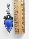 Making Waves Jewelry and Accessories artisan sterling silver pendant with blue chalcedony, labradorite, and moonstone.