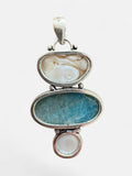 Making Waves Jewelry and Accessories artisan pendant with blue apatite, organic pearl, and mother-of-pearl in silver.