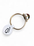 Making Waves Jewelry and Accessories oval ammolite ring in sterling silver with etched bezel and bead accents