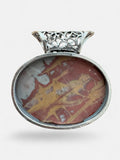 Making Waves Jewelry and Accessories oval jasper pendant with red, ochre, and grey tones and filigree metal bail.