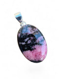 Making Waves Jewelry and Accessories oval rhodonite pendant with black and pink stone in a 925 sterling silver setting