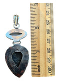 Back view of Making Waves Jewelry and Accessories artisan pendant with moonstone and labradorite in sterling silver.