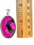 Making Waves Jewelry and Accessories oval pendant with hot pink and grey agate stone in a 925 sterling silver setting.