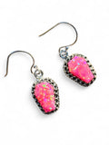 Making Waves Jewelry and Accessories neon pink coffin-shaped dangle earrings with textured silver-tone metal settings.