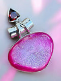 Making Waves Jewelry and Accessories sterling silver pendant with hot pink druzy agate and triangular garnet gemstone.