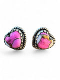 Making Waves Jewelry and Accessories heart stud earrings featuring pink spiny oyster shell set in sterling silver.