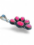 Making Waves Jewelry and Accessories sterling silver pendant featuring six vibrant pink opal cabochons with beaded trim