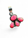 Making Waves Jewelry and Accessories sterling silver pendant featuring four hot pink opals in a rope-textured cluster