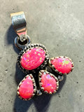 Making Waves Jewelry and Accessories sterling silver pendant with four hot pink opals in a rope-textured cluster design.